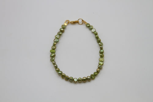 Glimmering Green Gold Bracelet